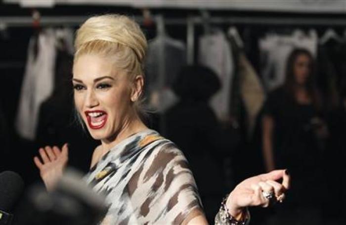 Designer Gwen Stefani speaks backstage before showing her L.A.M.B. Fall/Winter 2011 collection during New York Fashion Week February 17, 2011.