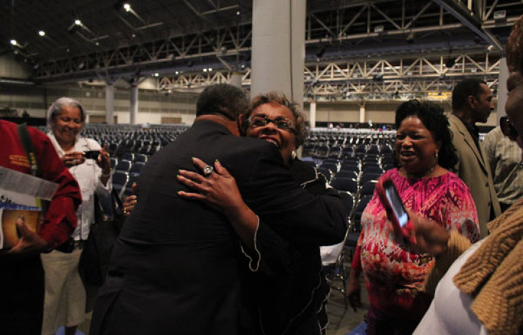 Fred Luter hugs an attendee at the Southern Baptist Convention's Annual Meeting in New Orleans, June 18, 2012. Luter was elected president of the SBC on June 19.