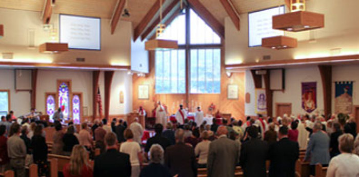 Worshippers in the sanctuary of Bishop Seabury Anglican Church.