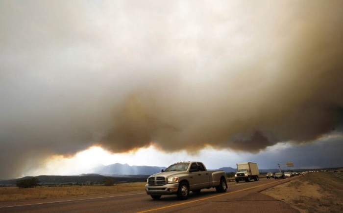 Traffic on I-25 north of Colorado Springs in Colorado gets heavy during the evacuation of 32,000 people as the result of the Waldo Canyon fire, June 21, 2012.