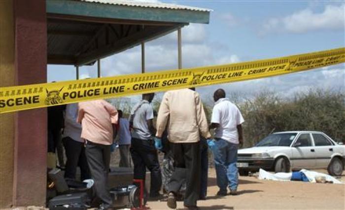 Kenyan security forces secure the African Inland Church after an attack in Kenya's northern town of Garissa, July 1, 2012.