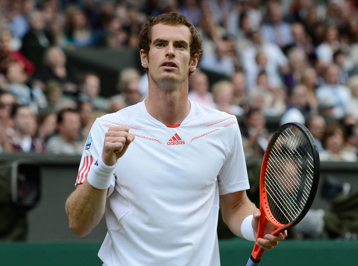 Andy Murray of Britain reacts during his men's semi-final tennis match against Jo-Wilfried Tsonga of France during their men's semi-final tennis match at the Wimbledon tennis championships in London July 6, 2012.a