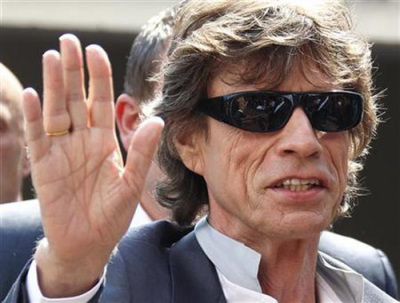 Rolling Stones lead singer Mick Jagger arrives at a photocall to promote the film Stones In Exile at the 63rd Cannes Film Festival May 19, 2010.