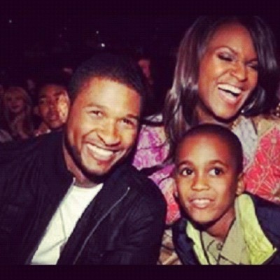 Usher with his former wife Tameka Foster, and his stepson Kyle Glover who has been declared brain dead