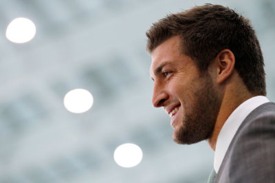 New York Jets quarterback Tim Tebow speaks at a news conference introducing him as a Jets at the team's training center in Florham Park, New Jersey March 26, 2012.