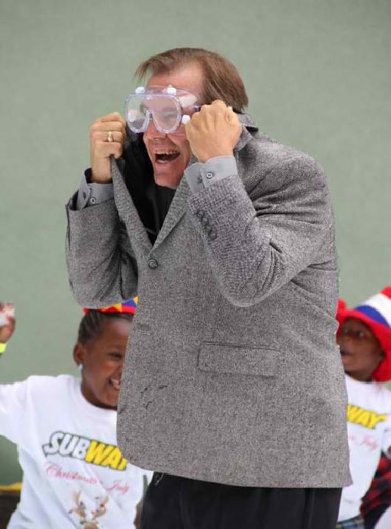 Andy Bales, CEO of Union Rescue Mission, plays in 20 tons of snow with homeless children during Christmas in July, sponsored by Subway, at Union Rescue Mission in Los Angeles in July 2011.