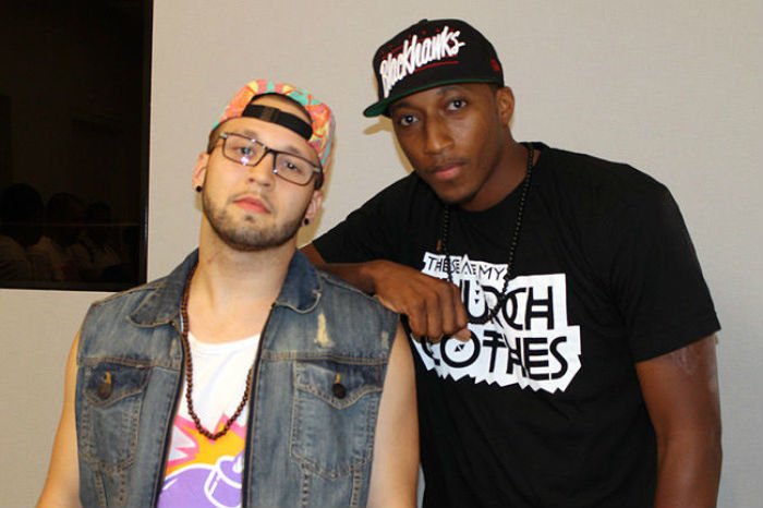 Reach Records labelmates Andy Mineo and Lecrae Moore pose for photographs in the briefing room at the Apple story in the SOHO neighborhood of NYC before heading on stage July 17, 2012.