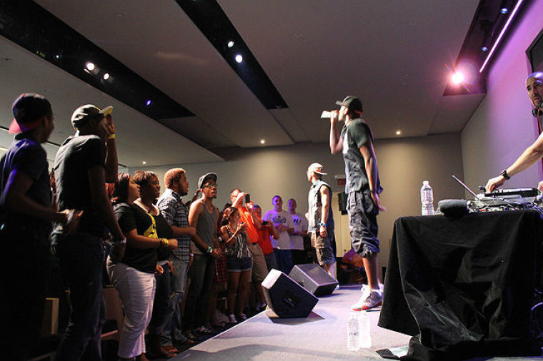 Lecrae and Andy Mineo brings the crow to their feet during a free show at the Apple store in SOHO, NYC July 17, 2012.