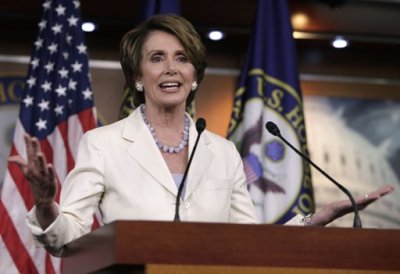 U.S. House Minority Leader Nancy Pelosi (D-Calif.), gestures during news conference on President Barack Obama's signature healthcare law on Capitol Hill in Washington June 28, 2012.