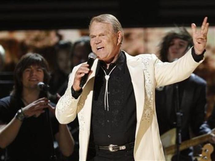 Glen Campbell sings ''Rhinestone Cowboy'' during his tribute at the 54th annual Grammy Awards in Los Angeles, California February 12, 2012.