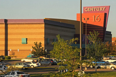 The Century 16 Theatre where a masked gunman killed 14 people at a midnight showing of the new Batman movie in Aurora, Colorado July 20, 2012. A masked gunman killed 14 people at a midnight showing of the new Batman movie in a suburb of Denver early on Friday, sparking pandemonium when he hurled a teargas canister into the auditorium and opened fire on moviegoers.