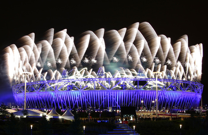 Fireworks explode over the Olympic Stadium during the opening ceremony of the London 2012 Olympic Games July 27, 2012.