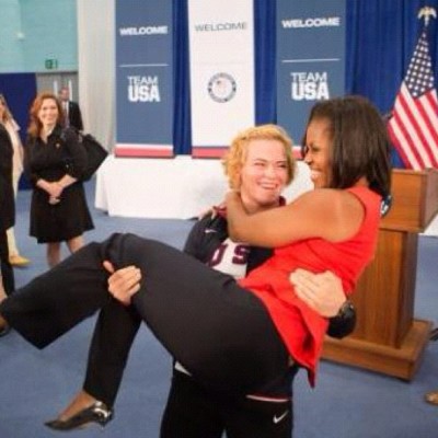 Olympics U.S.A. wrestler Elena Elena Pirozhkova picks up First Lady Michelle Obama at a meet and greet ceremony before 2012 Olympics in London.