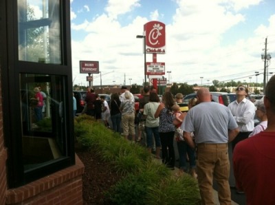 A line of patrons wraps around the building at a Chick-fil-A restaurant in North Canton, Ohio during Chick-fil-A Appreciation Day on Aug. 1, 2012.