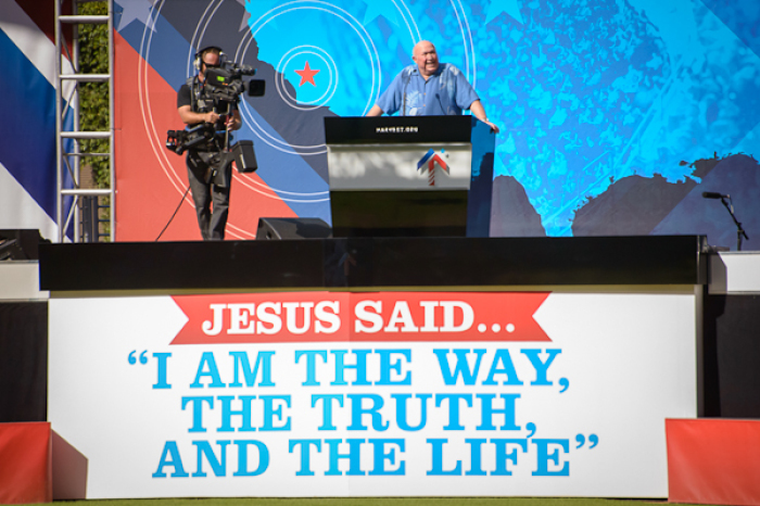 Calvary Chapel founder Chuck Smith opens Harvest America in Anaheim, Calif., with prayer, Aug. 26, 2012.