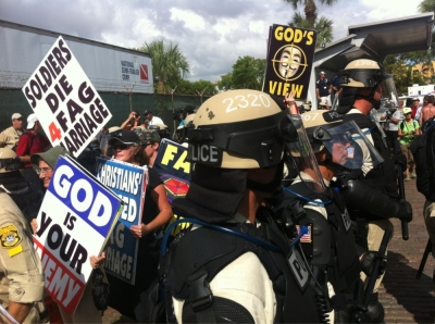 This image, shared by Elizabeth Park on Twitter, shows Westboro Baptist Church members and anti-Republican protesters in Tampa on Aug. 28, 2012.