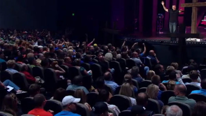 Thousands attend NewSpring Church in South Carolina as Pastor Perry Noble preaches, Sunday, Aug. 26, 2012.
