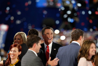 Republican presidential nominee Mitt Romney (C) is surrounded by family members after he accepted the Republican presidential nomination during the final session of the Republican National Convention in Tampa, Florida, August 30, 2012.