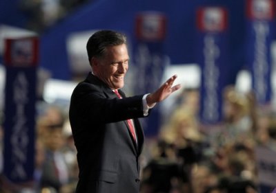 Republican presidential nominee Mitt Romney acknowledges applause as he accepts the Republican presidential nomination during the final session of the Republican National Convention in Tampa, Florida, August 30, 2012.