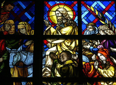 A stained glass window portraying a scene of the entry of Christ into Jerusalem in the 'Our Lady of Peace' basilica in the Ivory Coast capital of Yamoussokro is seen in this picture taken April 15, 2005.