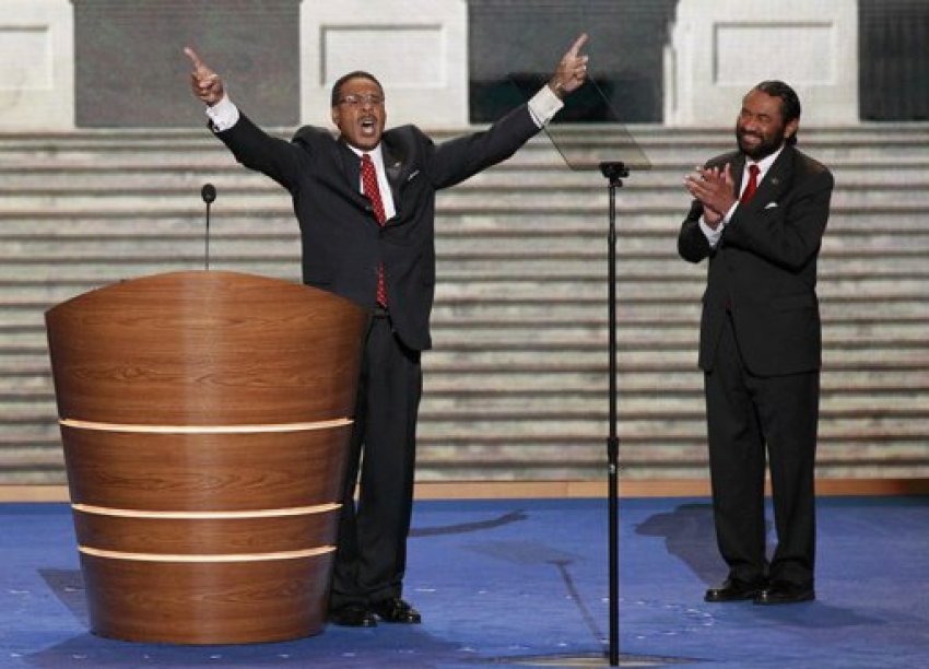 U.S. Rep. Emanuel Cleaver II, (D-MO), Chairman of the Congressional Black Caucus, is applauded by U.S. Rep Al Green (D-TX) at right as he concludes his speech during the second session of the Democratic National Convention in Charlotte, N.C., Sept. 5, 2012.