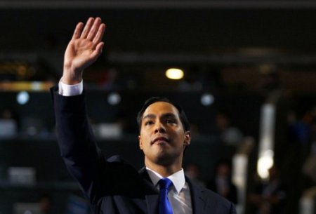 Keynote speaker and San Antonio, Texas Mayor Julian Castro waves while addressing the first session of the Democratic National Convention in Charlotte, North Carolina, September 4, 2012.