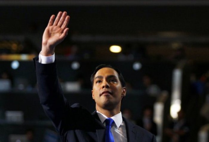 Keynote speaker and San Antonio, Texas Mayor Julian Castro waves while addressing the first session of the Democratic National Convention in Charlotte, North Carolina, September 4, 2012.