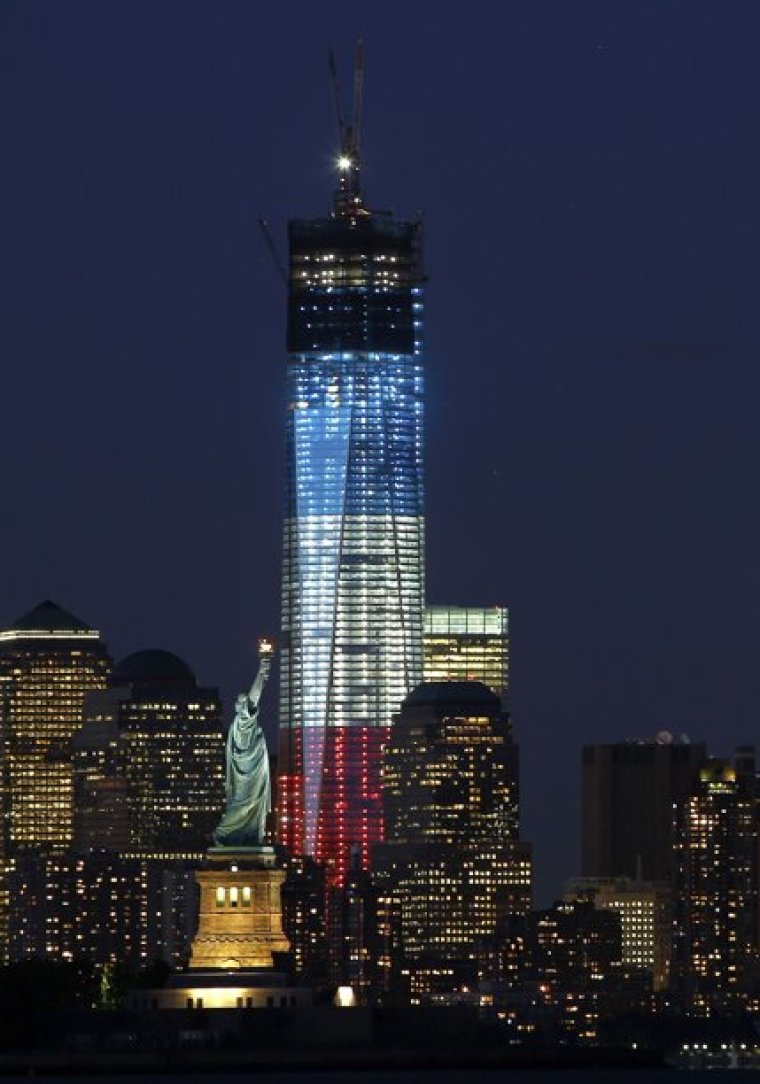 One World Trade Center stands tall on the skyline of New York behind the Statue of Liberty in New York, September 10, 2012. New York will mark the 11th anniversary of the attack on the World Trade Center with ceremonies on Tuesday.