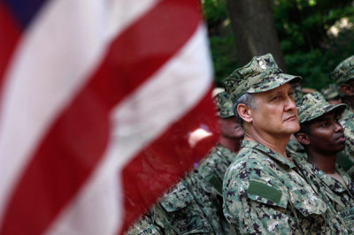 Construction Electrician First Class Renso Vidal, of the United States Navy, participates in a ceremony following a Memorial Day Parade in the Inwood Neighborhood of New York, May 28, 2012.
