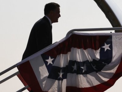 U.S. Republican presidential nominee and former Massachusetts Governor Mitt Romney boards his campaign plane in Salt Lake City, Utah, September 18, 2012.