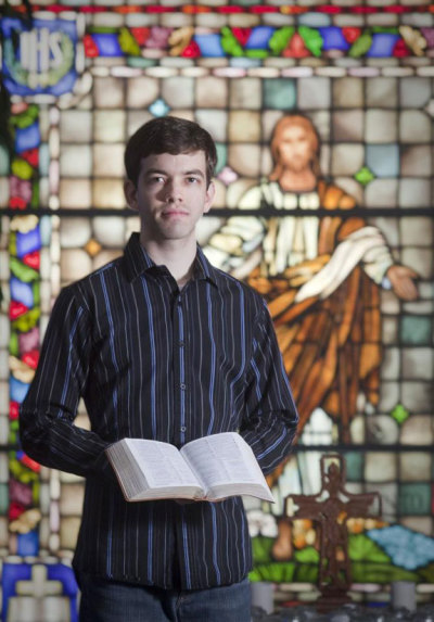 Matthew Vines holding a Bible in a photo dated Aug. 16.