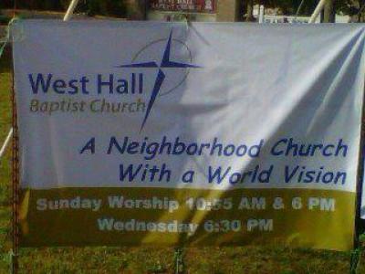 A banner erected by West Hall Baptist Church of Oakwood, Georgia.