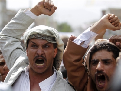 Protesters shout slogans during a protest on a road leading to the U.S. embassy on Sept. 21. They were protesting an anti-Islam film made in the U.S. mocking the Prophet Muhammad.