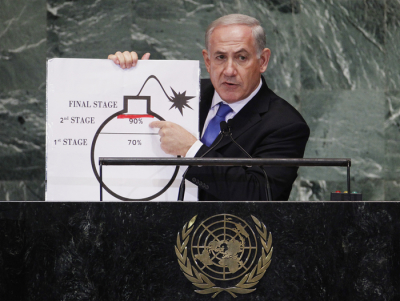 Israel's Prime Minister Benjamin Netanyahu points to a red line he has drawn on a graphic of a bomb used to represent Iran's nuclear program as he addresses the 67th United Nations General Assembly at the U.N. Headquarters in New York, September 27, 2012. The red line he drew represents a point where he believes, the international community should tell Iran that they will not be allowed to pass without intervention.