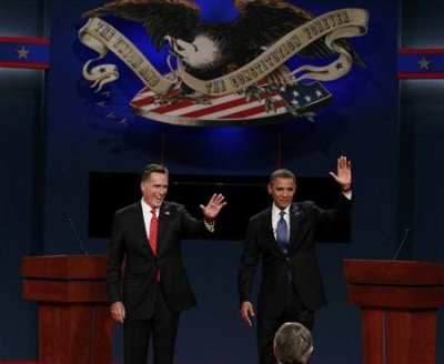 U.S. President Barack Obama and Republican presidential nominee Mitt Romney take the stage prior to the first presidential debate in Denver October 3, 2012.