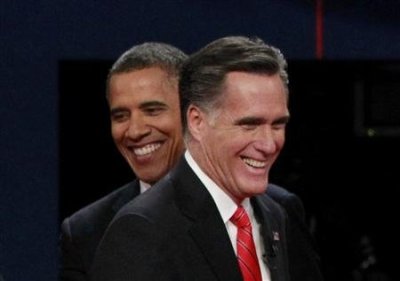 President Barack Obama (L) and Republican presidential nominee Mitt Romney share a laugh at the end of the first presidential debate in Denver October 3, 2012.