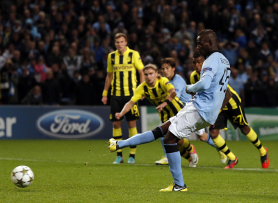 Manchester City's Mario Balotelli scores a penalty kick against Borussia Dortmund during their Champions League Group D soccer match in Manchester October 3, 2012.