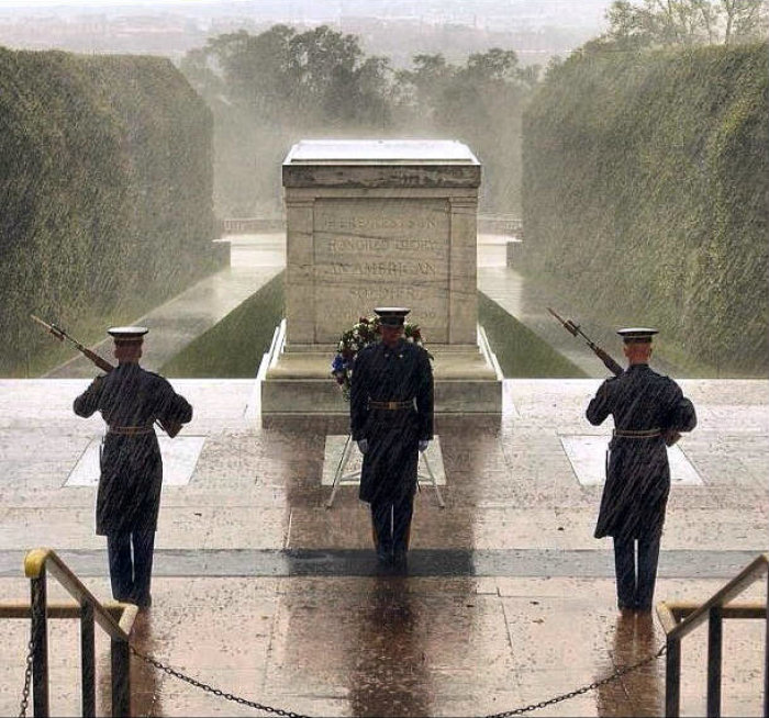 Honor Guards stand on duty at the Tomb of the Unknown Soldier in Sept. 2012, in Arlington County, Va.