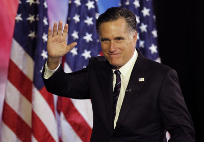 U.S. Republican presidential nominee Mitt Romney waves after his concession speech during his election night rally in Boston, Massachusetts November 7, 2012.