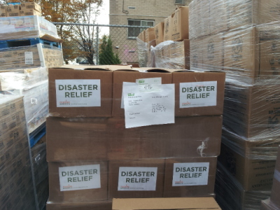 A picture showing the goods being given out to victims of Hurricane Sandy.