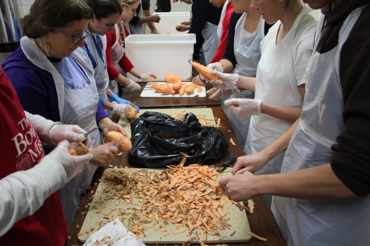 Volunteers peeling and cooking at the Bowery Mission in Lower Manhattan on Nov. 19, 2012.