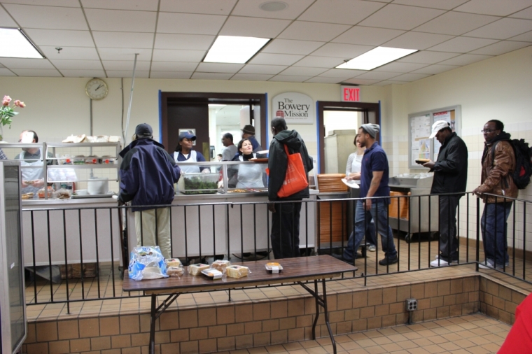 Volunteers serving meals to guests at The Bowery in Lower Manhattan on Nov. 19, 2012.