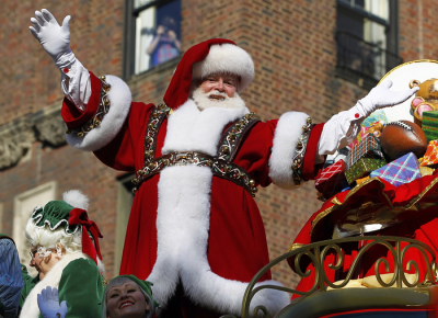 Santa Claus rides on his sleigh down Central Park West in New York November 22, 2012.