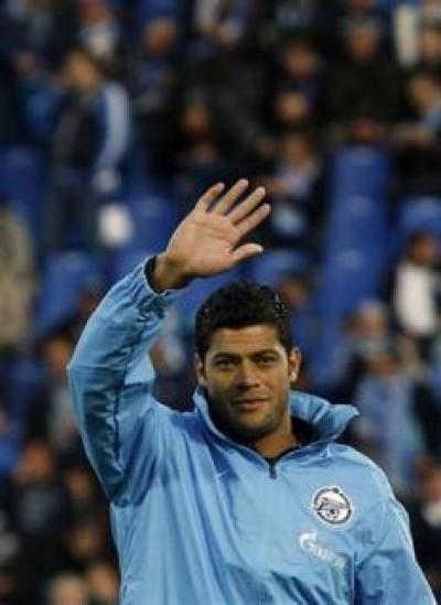 Zenit St. Petersburg's new signing Hulk waves to the fans before their Russian championship soccer match against Terek Groznyi at the Petrovsky Stadium in St. Petersburg, September 14, 2012.
