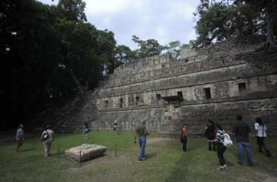 Visitors tour the archaeological site of the Maya civilization of Copan December 19, 2012.