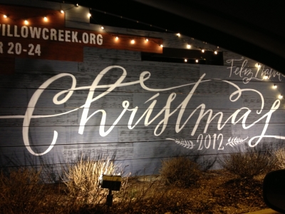 This photo shows a hand-painted Christmas sign at the Willow Creek Community Church's entrance in South Barrington, Ill.