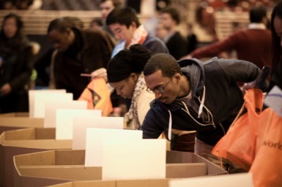 Students (16,000) attending Urbana 12 assembled 32,000 AIDS caregiver kits in about two hours. The kits will be distributed with the help of World Vision to caregivers in Swaziland and other African countries, Dec. 29, 2012.