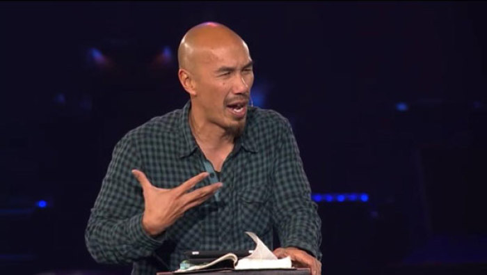 Francis Chan, best-selling author of Crazy Love and Erasing Hell, speaks to some 60,000 students at the Passion 2013 conference in Atlanta, Georgia, on Wednesday, Jan. 2, 2013.