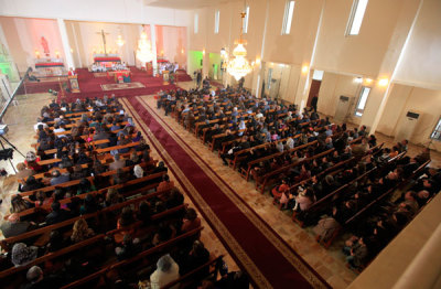 Iraqi Christians attend a mass on Christmas at St. Joseph Chaldean church in Baghdad December 25, 2012.