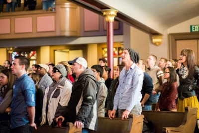 Worshipers attend official opening service at Mars Hill Church Downtown Seattle inside historic church c. 1910, Jan. 13, 2013.